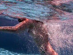 Naked Girl Is Swimming In The Pool