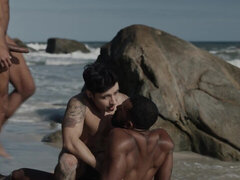 Appealing men make out in outdoor group sex by the beach