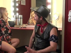 Dude dressed as a cowboy is fucking a slut backstage