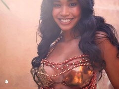 Horny Japanese babe Putri Cinta shows off her big brown tits