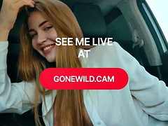 Cute redhead rides in her car