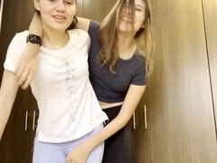 Two lesbians get it on in the car