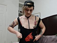 Tom boy, Lauren Laurent, lubes her hairy pussy and puts her weird dildo to use