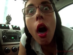 Amateur brunette schoolgirl in eyeglasses masturbating outdoors in her car