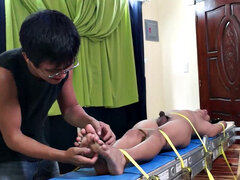 We just can't get enough of gorgeous Gil! We brought him back for some tickle fun, and this time we strapped him on our tickle rack.