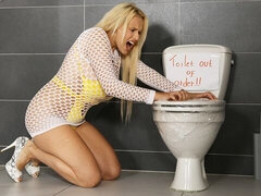 Soloing fetish doll with big boobs Angel Wicky plays with urine