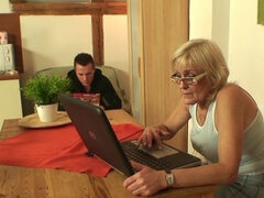 Screwing the older blonde on the kitchen table