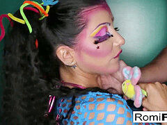 Romi gargles a large schlong