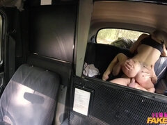 A stanger bangs some hot chick with big juggs in the taxi cab