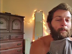 Bearded jock jerks off and fingers his oiled up ass for cum