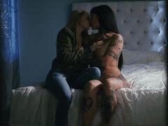 Brunette with tattoos has lesbian sex in the bedroom