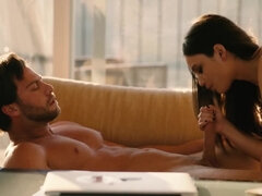 Seth Gamble and Liv Wild are having passionate oral sex on the couch