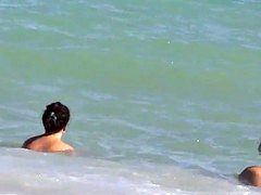 Natural tits and pussies in this beach spy video