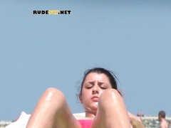 Fresh nudist teen filmed fooling around on the beach