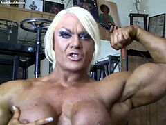 powerful nude bodybuilder displays her big clit in the gym