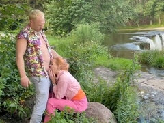 ������������Romantic lovemaking in nature at the waterfall at dawn������������