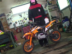 Biker girl Roxy Taggart touching herself in the garage