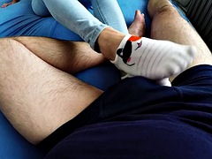 My stepsister gives me a handjob with her socks and I fill her socks with cum