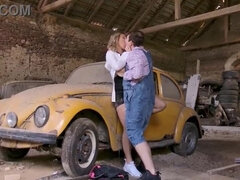 Stacked blonde cougar seducing the car mechanic for sex