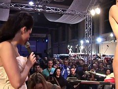 Hot slut playing with a rock hard cock at the sex show