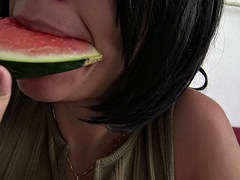 Horny French beurette with natural tits eats a juicy watermelon
