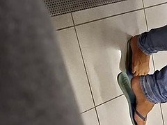 Amateur flip-flop dangling on bank