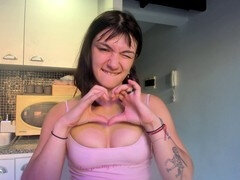 Muscular woman does a nude workout with a sexy tattooed lady