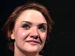 Dominated redhead punished with caning