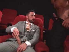 Two handsome gays fuck in the cinema