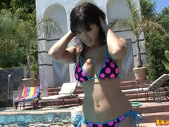Sunny Leone bikini solo - Young exotic brunette outdoors
