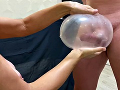 Old lady caress teen cumshot condom handjob