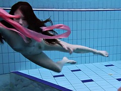 Andreika and Aneta swim naked in the pool