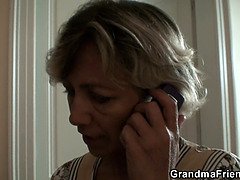 Two guys share old blonde cougar