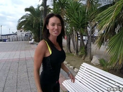Franceska Jaimes in a leggings posing on the bench in public