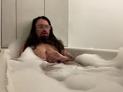 Having fun with my cock in the bubble bath