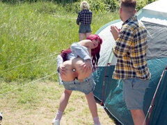 While away on a camping trip, dark-haired hunk Michael Fly proposes to his girlfriend, who excitedly relays the news to her BFF, sexy redhead Yenifer 