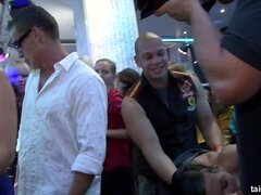 Busty brunette has fun at the night club