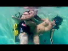 Scuba diver fucks brunette girl by the swimming pool