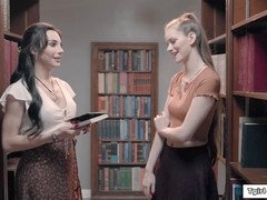Shemale Ariel Demure dominates girl in the library