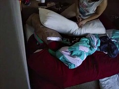 Horny woman knows how to use a pillow to masturbate