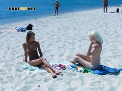 Ravishing nude beach girls tanning