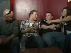 Brunette girl is interviewing guys for porn casting in the club