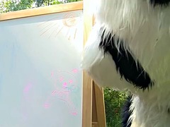 Sexy strapon fuck with a young artist outdoors