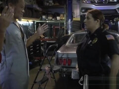 Female officers search mechanic shop when they find his tool