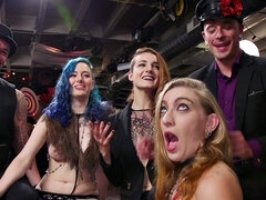 Blonde dominas fist their bound lesbian friends in a wild public orgy