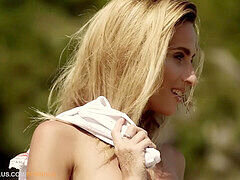 Cara Mell enjoys sand and surf in a PlayboyPlus shoot