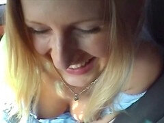 German blonde slut enjoys giving a blowjob in the car