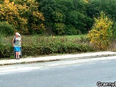 Hitchhiking old granny and boy