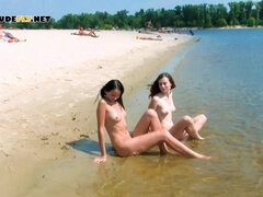 Preatty young nudist chicks have fun at the beach