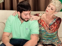 Short-haired mature Lin Boyde knows how to suck a big young cock